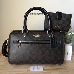 100% Authentic Coach F83607 Signature Rowan Comes With A Matching Wallet Brown/Black/Gold Hardware **New With Tags** Approximate Measurements: 10″ (L) X 6.5″ (H) X 5″ (W) Handles With 5.5" Drop Detachable Strap With 21" Drop For Shoulder Or Crossbody Wear Mom Purses, Luxury Bags Collection, Coach Tote Bags, Black Leather Satchel, Coach Tote, Coach Leather, Purses Michael Kors, Satchel Handbags, Coach Swagger Bag