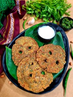 some food is sitting on a green plate