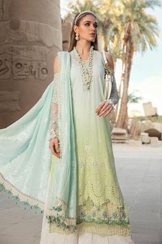 The new party and festive wear collection is all set to grab your attention with designer eid dresses. You can buy lavish fancy wear online to adorn your special event look in an elegant way. Shirt: This lavish festive attire is showing its grace with elegant blue and green color embroidered panels for shirt. Chiffon shirt is embellished with schiffli embroidered front and printed back panel. Neck is designed with lawn embroidered neckline. Schiffli embroidered sleeves are designed with beautifu Maria B Lawn, Latest Pakistani Dresses, Eid Dress, Pakistani Dresses Online, Pakistani Designer Suits, Pakistani Fashion Casual, Lawn Dress, Eid Dresses, Pakistani Salwar Kameez