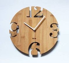 a clock made out of wood with numbers on it