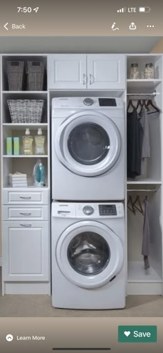 a white washer and dryer sitting next to each other in a laundry room