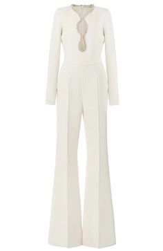 Long Sleeve Crystal Trim Jumpsuit White DESIGN: Color: White V-neck Long sleeves Cut-out detail Embellished with rhinestones Concealed zipper at back Body sculpting design Gentle Dry Clean Only Length: Maxi MATERIAL: Polyester + Cotton High quality durable fabric. High elasticity for a better fit.  Delicate sewing and hemming by durable needle lockstitch machine. YKK zipper (known as the most durable and reliable zippers manufactured today). To maintain the beauty of your gartment, please follow the care instructions on the attached label. Colour may vary due to lighting on images. The product images (without model) are closest to the true colour of the item.   * Order one size up for a relaxed fit. * Pay special attention on measurements to ensure proper fit. * If you are b Embellished Jumpsuit, Romper Designs, White Jumpsuit, Inspirational Celebrities, Long Sleeve Jumpsuit, Long Jumpsuits, Jumpsuit Fashion, Diamond Shaped, Elie Saab