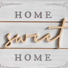 a wooden sign that says home sweet home