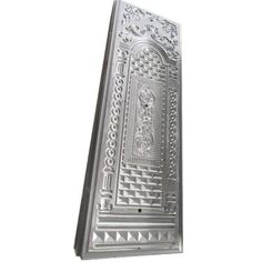 an intricately designed metal door on a white background