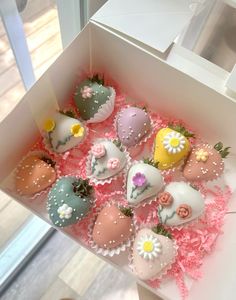 a box filled with assorted chocolate covered strawberries