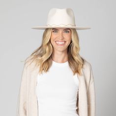 Introducing Amore - a luxurious wool fedora with a stiff brim and twisted rhinestone trim. The ivory color, organza back ties, and inner satin lining add a touch of elegance to this statement piece. With an adjustable fit and 3.5" brim, this fedora is perfect for any woman looking for sophistication and style. Features: Color: Ivory Material: 100% Wool Brim Size: 3.5" Size: 57cm Wool Felt Stiff Brim Fedora Twisted Rhinestone Trim Organza Back Ties Inner Satin Lining Adjustable Elegant Fur Felt Panama Hat For Fall, Fitted Cream Panama Hat Fedora, Elegant Cream Fedora Panama Hat, Elegant Cream Panama Hat With Flat Brim, Cream Panama Fedora Hat, Elegant White Fedora With Flat Brim, Elegant Beige Fur Felt Fedora, Elegant Cream Fedora Hat, Elegant Cream Wide Brim Fedora