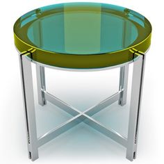 a glass table with metal legs and a green tray on the top that has been placed in front of a white background