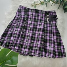 Purple Pleated Plaid Miniskirt With High Waist And Concealed Side Zipper And Two Buckle Accents New, Was Too Small On Me Have The Original Bag It Came In Cheap Purple Pleated Mini Skirt, Pastel Purple Plaid Skirt, Cheap Purple Lined Mini Skirt, Cheap Pleated Multicolor Mini Skirt, Purple Summer Skirt For School, Purple Summer School Skirt, Summer School Purple Skirt, Purple Mini Skirt For Summer School, Purple Mini Skirt For School In Summer