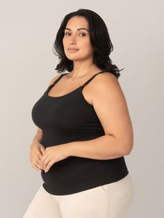 A luxe foundational piece for all breastfeeding moms. This super-cute, supportive nursing cami features clip-down cups, a fitted silhouette, and a delicate picot trim at the neckline. Crafted from a stretchy fabric chosen for its softness, breathability, and durability, this elevated nursing tank top offers a flattering fit and a built-in shelf bra with fixed padding for additional support and shaping.  Close fit great on its own or as a layering piece Nursing clips for breastfeeding and skin-to Supportive Sleeveless Tank Top With Adjustable Straps, Supportive Tank Top With Adjustable Straps, Stretch Camisole Nursing Bra With Built-in Bra, Supportive Nursing Bra For Everyday Use, Maternity Nursing Bra, Stretch Nursing Bra With Wide Straps, Supportive Tops With Built-in Bra And Wide Straps, Supportive Bra Friendly Tank Top, Fitted Nursing Bra For Everyday