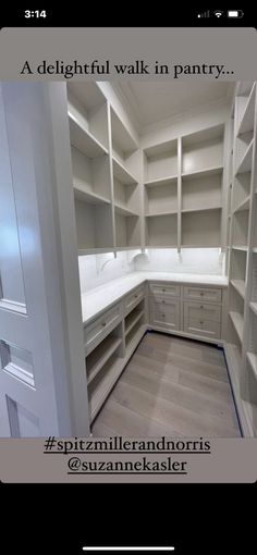 an empty walk in closet with white shelving