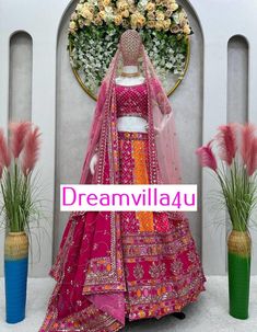 Lehenga Fabric: Faux Georgette with Digital Print Work: Thread with sequence Size: Up to 44 Inner Fabric: Micro Type: Semi-Stitched Flair: 3 meters (includes canvas patta and cancan) Choli Fabric: Faux Georgette with Digital Print Work: Thread with sequence Size: Up to 42 (Un-Stitched) Dupatta Fabric: Faux Georgette Buttery Net Work: Thread with sequence Size: 2.20 meters Weight Total Weight: 2 kg Pink Semi-stitched Traditional Wear For Festival, Multicolor Saree With Gota Work For Reception, Multicolor Floor-length Lehenga With Gota Work, Multicolor Floor-length Traditional Wear With Gota Work, Multicolor Wedding Gown With Dori Work, Diwali Pink Choli With Pallu, Pink Choli With Pallu For Diwali, Multicolor Embroidered Gown With Pallu For Festivals, Festival Gown With Multicolor Embroidery And Pallu