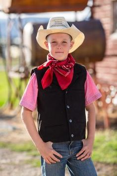 The Youth Bronco Canvas Vest is made from our premium 12 ounce cotton canvas, is durable and strong, just what the upcoming little working rancher and cowboys need. This vest has several unique elements, one being the shoulder western yoke on the front and back of the vest, an open v-neck with lapel and four Wyoming Traders logo buttons. This vest is lined with a polyester satin lining. The Bronco Vest has four front welt pockets, two for your hands and two chest pockets, all lined with a polyes Canvas Vest, Tractor Supply, The Youth, Kids Outerwear, Back Shoulder, Polyester Satin, Wyoming, Welt Pockets, Welt Pocket