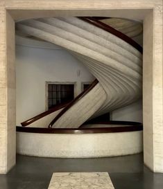 a large white sculpture in the middle of a room