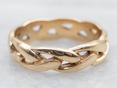 A simple braided twist of gold, this pattern represents the binding together of two souls. Wear it as a wedding band, or a simple stacking ring!Metal: 14K Yellow Gold Width of Band: 5.2 mmHeight off Finger: 1.7 mmRing Size: 7.50 Braided Twist, Simple Stacking Rings, Stacking Bands, Ring Metal, Anniversary Bands, Stacking Ring, Gold Band, New Hampshire, Stacking Rings