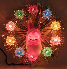 a small animal with many lights on it's head