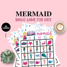 the mermaid game for kids is on top of a pink background with a cup of coffee and