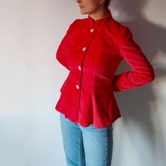 With this advanced-level digital Sewing Pattern, you can sew a sleek Hourglass shaped Blazer with Stand Collar. The Jacket features a slim fit silhouette, has a single-breasted button fastening closure, and is fully lined. Making it with fine fabrics, it is ideal for ceremonies and receptions. In denim or corduroy, combined with a pair of jeans, it's perfect for casual outings. This garment is sure to stand out. Fitted Red Blazer With Buttons, Slim Fit Outerwear With Buttons For Office, Slim Fit Office Outerwear With Buttons, Fitted Button-up Blazer With Button Closure, Fitted Blazer With Stand Collar And Covered Buttons, Slim Fit Blazer With Button Closure, Fitted Blazer With Stand Collar, Fitted Long Sleeve Blazer With Buttons, Fitted Blazer With Suit Collar And Buttons