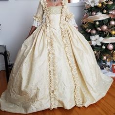 Marie Antoinette Wedding Dress Historical Design, Rococo Style Ball Gown Wedding Dress, Elegant Historical Wedding Ball Gown, Historically Designed Fitted Dresses For Ceremonies, Fitted Dresses With Historical Design For Ceremony, Fitted Dress With Historical Design For Ceremonies, Cream Ball Gown For Debutante Ball, Rococo Style Ball Gown For Wedding, Elegant Victorian Wedding Dress With Cancan