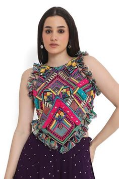 Purple and multi color sleeveless back tie-up choli with all over boho tribe vibe embroidery and tassel embellishments. Paired with a mukaish dot embroidered sharara with tassel detailing. - Aza Fashions Multicolor Sleeveless Sets With Mirror Work, Fitted Multicolor Tops With Dori Work, Embellished Multicolor Choli, Multicolor Embroidered Sleeveless Sets, Multicolor Sleeveless Embroidered Sets, Multicolor Sets With Woven Motifs For Festive Occasions, Festive Multicolor Sets With Woven Motifs, Embellished Multicolor Blouse Piece For Festivals, Sharara For Women