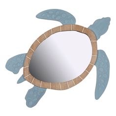 a mirror shaped like a turtle is shown