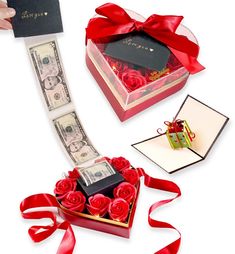 roses in a gift box with money and red ribbon