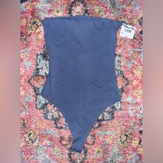 American Eagle Strapless Twist Bodysuit Never Worn With Tags Still On!! Fitted High Waist Blue Bodysuit, Blue High Waist Stretch Bodysuit, Blue Backless Bodysuit For Night Out, Blue Stretch Backless Bodysuit, Low Cut Bodysuit, Strapless Bodysuit, Cami Bodysuit, Tank Bodysuit, Velvet Bodysuit