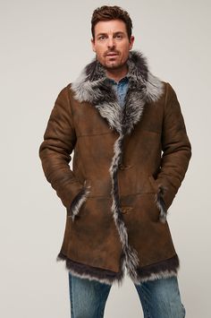 The raw edges of this on-trend design reveal the luxurious Toscana shearling insulation that also lavishes the large collar and trims the placket, cuffs, and sweep. Our Jackson button-front coat showcases distressed Spanish sheepskin, hand pockets with hidden magnet closures and 1 zip pocket inside for invisible storage.