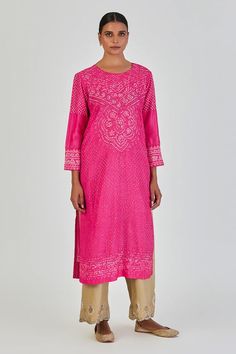 Fuchsia pink three fourth sleeves straight kurta with all over bundi with different patterns of bandhani, dots, chaubundi, leheriya and paisley motifs. Paired with a palazzo with embellished lace embroidered scalloped hem. - Aza Fashions Designer Pink Palazzo Set With Bandhani Print, Fitted Pink Traditional Wear With Bandhani Print, Pink Traditional Wear With Cutdana For Spring, Pink Cutdana Traditional Wear For Spring, Spring Pink Traditional Wear With Cutdana, Pink Cutdana Kurta For Spring, Pink Long Sleeve Traditional Wear With Cutdana, Pink Bandhani Print Kurta For Navratri, Pink Bandhani Print Bollywood Style Kurta