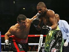 two men in the ring during a boxing match