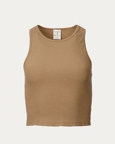 Pair this crop top with your favorite high-waisted jeans or maxi skirt. Fabrication: 96% Cotton, 4% SpandexCare: Hand wash cold, lay flat to dryStandard Clothing Sizing By Together Cropped Ribbed Stretch-Cotton Top in Mocha | Mocha | Materials & Care Instructions: ['96% Cotton, 4% Spandex', 'Made in USA'] Ribbed Cropped Tank Top In Beige, Brown Fitted Cropped Tank Top, Fitted Brown Basic Crop Top, Brown Stretch Crop Top, Brown Fitted Crop Top For Everyday, Fitted Brown Crop Top For Everyday, Casual Brown Cropped Tank Top, Trendy Beige Crop Top For Everyday, Casual Seamless Solid Crop Top