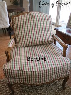 a chair that has been upholstered with fabric and is sitting on a rug