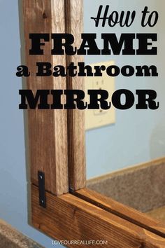 a bathroom mirror with the words how to frame a bathroom mirror