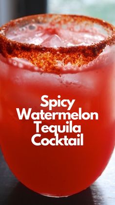 a close up of a drink on a table with the words spicy watermelon tequila cocktail