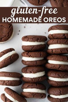 gluten - free homemade oreos with white frosting on top and chocolate cookies in the background