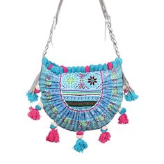 "A gorgeous crossbody bag handmade in Thailand. This bag made with Hmong tribes embroidery, silver metallic leather is the perfect boho bag for every occasion. We buy materials from the Hmong market and we design and sew by hand. Some of the bags we modify to improve the product. The Hmong tribes live in the North of Thailand and have origins from the Tibetan area of China. N.B. YOU MAY NOT RECEIVE THE EXACT BAG PICTURED HERE, AS THE FABRIC DESIGN MAY VARY SLIGHTLY FROM BAG TO BAG. THE EMBROIDER Sew By Hand, Boho Wallet, Unique Backpacks, Festival Bag, Embroidered Fabric, Boho Bag, Bag Handmade, Womens Purses, Metallic Leather