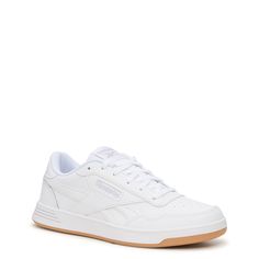 These women's Reebok Court Advance white/cold grey/gum fashion athletic shoes can take your sporty looks a notch up. Featuring leather upper, these athleisure sneakers have optimal lace-up closure, perforations on toe box for ventilation, plush textile lining, cozy OrthoLite sockliner, DMX Microbubbles in midsole for enhanced comfort, and long-lasting rubber outsole. This style is exclusive to Designer Brands Canada. | Reebok Women's Court Advance Sneaker in White/Cold Grey/Gum Leather Size 8. 5 Reebok Women Outfits, Fashion Athletic Shoes, Reebok White Sneakers, Reebok Shoes Women, Money Clothes, Wide Sneakers, Aged Cheese, Sporty Looks, Athleisure Sneakers