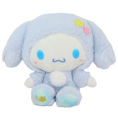 a blue stuffed animal with stars on its head