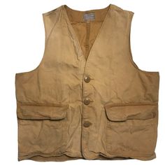 International Shipping Available!! This is a killer 1960s-70s Sears brand Hunting vest. This vest is in broken in vintage condition. Please refer to all pictures and measurements before buying since all sales are final. Measurements taken while laying flat. 22.5 inches pit to pit. 24 inches from top of collar to bottom of vest. Since all sales are final, I am happy to answer any questions you may have to ensure you know exactly what you are getting. Also, feel free to contact me for internationa Retro Vest With Pockets, Retro Sleeveless Vest With Pockets, Vintage Vest With Pockets, Vintage Cotton Vest For Outdoor, Vintage Beige Workwear Vest, Vintage Brown Sleeveless Outerwear, Vintage Workwear Vest, Vintage Cotton Vest Outerwear, Vintage Khaki Vest With Pockets