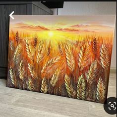 an acrylic painting of a sunset over a wheatfield