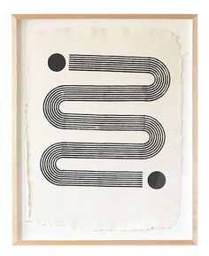 a black and white print with circles in the shape of two letters, on a beige background