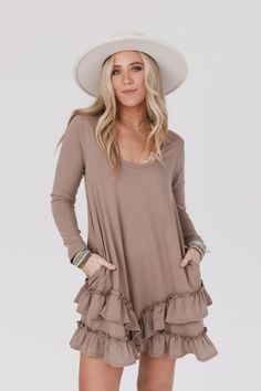 You'll love this effortlessly flattering and laid back boho dress, the Constance Ruffle Hem Long Sleeve Dress, is the perfect addition to your style this season! You'll love dressing this up or down because it features: Comfortable stretch tee shirt fabric Relaxed and loose dress silhouette at a mini length Flattering Beige Mini Dress With Ruffle Hem For Fall, Beige Long Sleeve Mini Dress With Ruffle Hem, Flowy Mini Dress With Ruffle Hem For Fall, Fall Flowy Mini Dress With Ruffle Hem, Long Sleeve Flowy Ruffle Dress For Fall, Flowy Long Sleeve Ruffle Dress For Fall, Fall Mini Dress With Ruffle Hem For Brunch, Casual Long Sleeve Ruffle Dress For Spring, Fall Long Sleeve Ruffle Dress