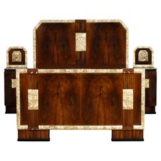 an art deco style bed with wooden headboard and foot board, inlaided with mother of pearl