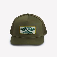 the original hat in khaki green, with an embroidered patch on the front