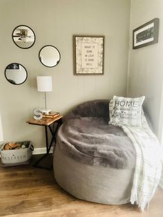 a large bean bag chair sitting in the corner of a room