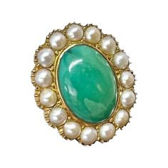 This is a gorgeous antique Turquoise Ring with a Pearl Halo. In the center is a stunning 19mm by 14mm by 5mm Turquoise Cabochon. The ring is from the estate of Hollywood Legend Mary Lou Daves and was a gift from her husband, the director Delbert Daves. Ms. Daves' jewelry exemplified her exquisite taste. Her jewels were unique, dramatic and elegant. The vivid oval Turquoise cabochon is of such lovely color and has great warmth and luster. The turquoise is surrounded by a halo of 15 silvery white Pearl Halo, An Affair To Remember, Antique Turquoise, Famous Art, Pearl Set, Bel Air, Gold Design, Lovely Colors, Cocktail Ring