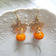 Pumpkin Earrings Gold Leaf and Glass Orange Pumpkin Earrings - Etsy Pumpkin Beads, Pumpkin Bead, Fruit Earrings, Pumpkin Earrings, Glass Pumpkins, Orange Pumpkin, Earrings Metal, Metal Leaves, Pumpkin Orange