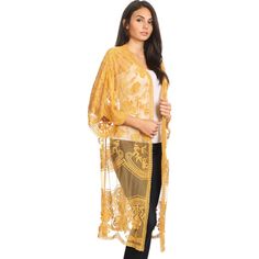 Embrace bohemian elegance with the Anna-Kaci Embroidered Floral Butterfly Duster Cover Up Cardigan. This long maxi duster cardigan features intricate embroidery and a sheer lace design, providing the perfect blend of modesty and allure for any occasion. With its loose fit, open front, and extra-large armholes, it flatters all body types and adds a dramatic, flowy touch to your outfit. Non-stretch V-neck Bohemian Cardigan, Non-stretch Bohemian V-neck Cardigan, Bohemian Long Spring Outerwear, Long Spring Festival Outerwear, Fitted Lace Cover-up For Spring, Fitted Bohemian Cardigan With Floral Embroidery, Embroidered Outerwear For Beach In Fall, Spring Lace Patchwork Cover-up, Embroidered Outerwear For Fall Beach Days