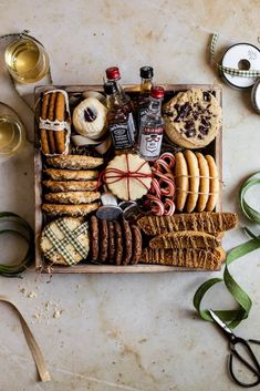 a wooden box filled with cookies and pastries