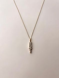 Handmade Modern Raindrop Crystal Necklace ✨ Genuine Swarovski Crystals in a modern abstract raindrop designed bezel setting.  18 Karat Gold Filled 💫 The perfect layering addition to your jewelry!  Necklace comes on a fully adjustable 18k gold filled dainty chain, can be worn as a choker or up to 18" long. All 18 karat gold filled metal is hypoallergenic, nickel free, and lead free.  Handmade ethically in my home studio in Brookings, South Dakota.  Each piece is packaged in my Mandy Ellen Designs gift packaging with a polishing cloth included. House Necklace, Gold Necklace Pendant, Necklace Layering, Dope Jewelry, Dainty Chain, Funky Jewelry, Handmade Modern, Modern Necklaces, Gold Necklace Layered