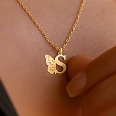 Personalize Your Style with Our Butterfly Initial Necklace. Crafted with precision and attention to detail, this necklace is the perfect way to showcase your personal style. Metal: Stainless Steel Available in a variety of finishes: 🌹 Rose Gold 🟡 18k Gold 🥈 Silver The chain length options include: - 16" - 18" - 20" - 22" Each necklace is meticulously: ✨ Designed ✨ Polished ✨ Assembled Please note: All our items come with a 5 cm/2" extension chain. so don't hesitate about the size!! * 14" NECK Gold Letter-shaped Jewelry For Gifts, Gold Letter-shaped Jewelry Gift, Gold Letter Necklace For Gifts, Gold Letter Necklace For Gift, Gold Letter Charm Necklaces, Metal Letter Jewelry For Gift, Metal Letter-shaped Jewelry For Gifts, Letter-shaped Metal Jewelry For Gifts, Metal Letter-shaped Jewelry As Gift